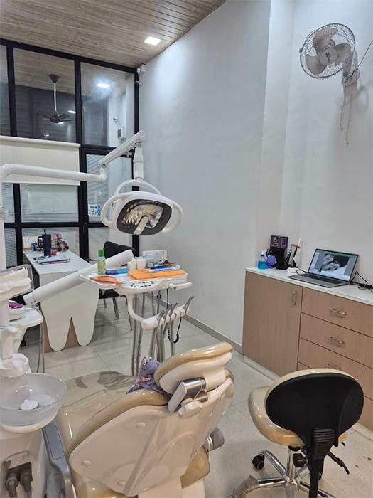 Smiling patient at WOW Dental Studio